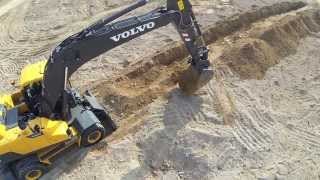 Volvo EW205D Wheeled Excavator promotional video [upl. by Irahk]