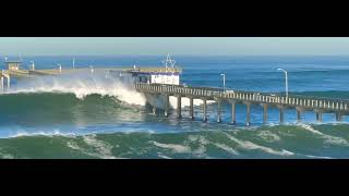 Waves Destroy OB Pier and take down surfer [upl. by Sinegold]